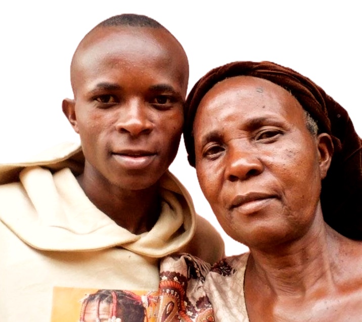 Bugingo "Desire" Moses with his mother, Mrs. Nkiinzi Grace